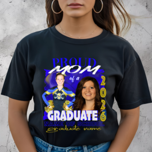 Customized black t shirt with a graduation theme on a woman. With the wording "Proud Mom of a Graduate" showing a way to personalize with the customers relation to the graduate, in this case Mom. A way to add the customers school name and graduate name.