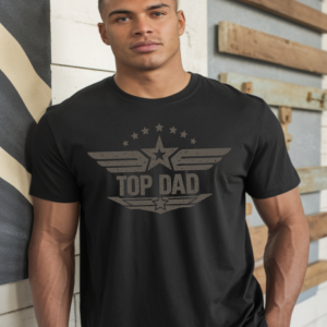 Black custom t-shirt with a military-style "Top Dad" graphic featuring wings, stars, and distressed lettering worn by a man