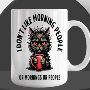 White ceramic coffee mug featuring an angry fluffy cat with glowing red eyes clutching a red coffee mug, with the text "I Don't Like Morning People Or Mornings Or People"