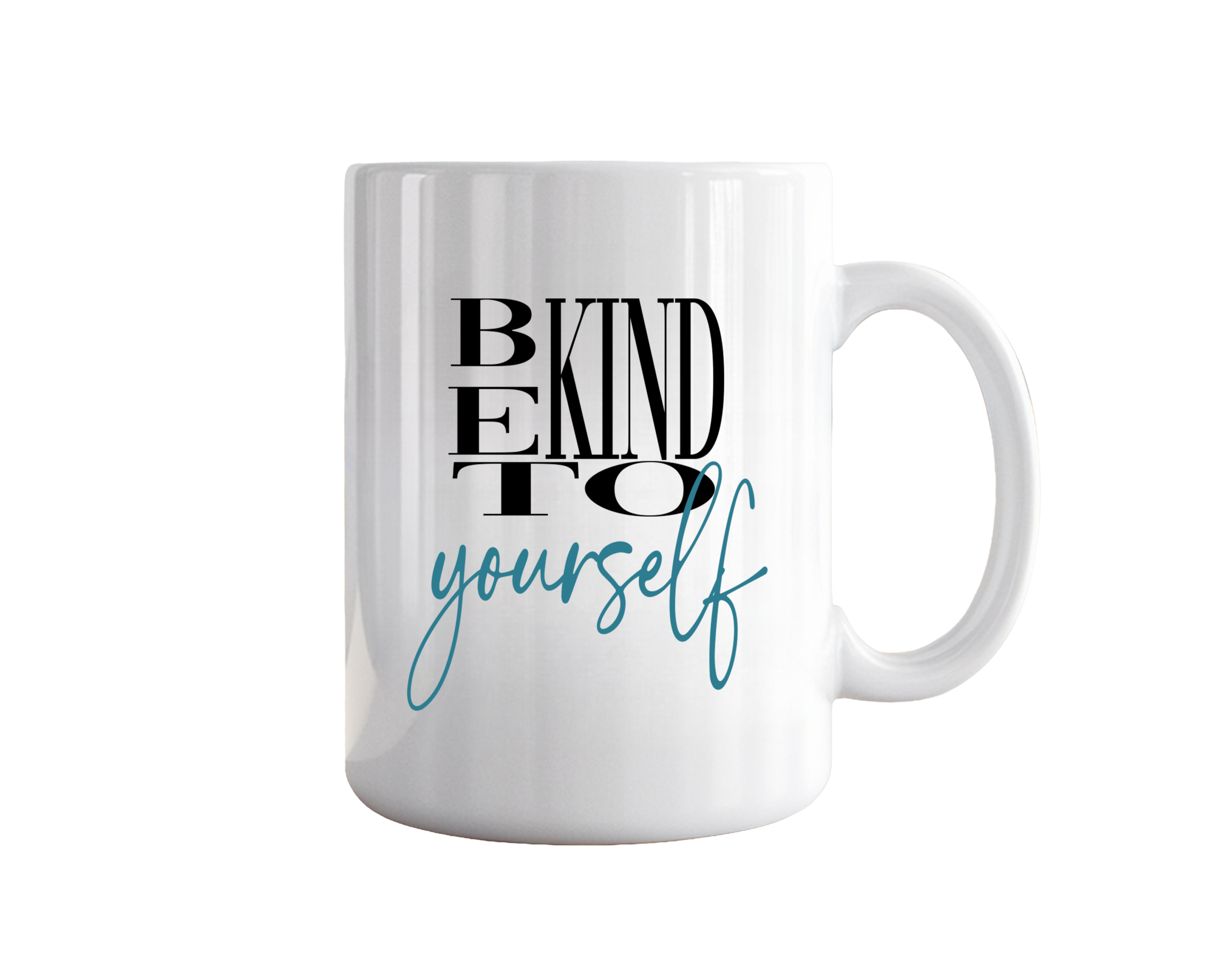 a white ceramic coffee mug printed with the bold black text "BE KIND TO" stacked vertically, and "yourself" written below in flowing teal script against a plain white background.